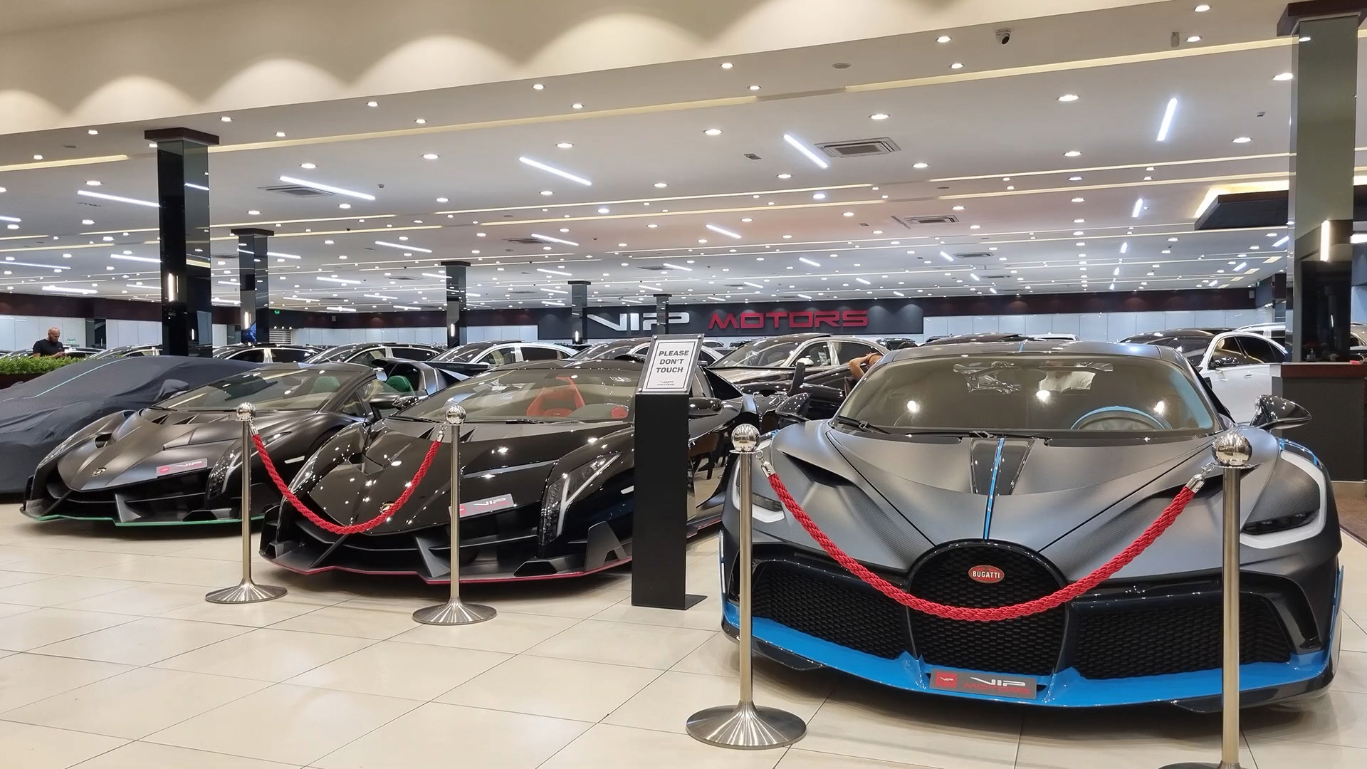Dubai hypercar showroom with Bugatti and Lamborghini