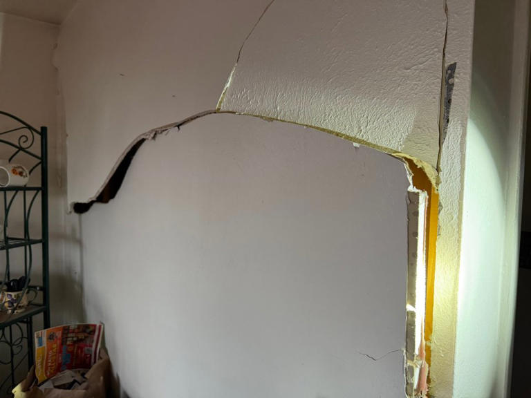 Explosion lifts roof while family inside Lakewood townhome