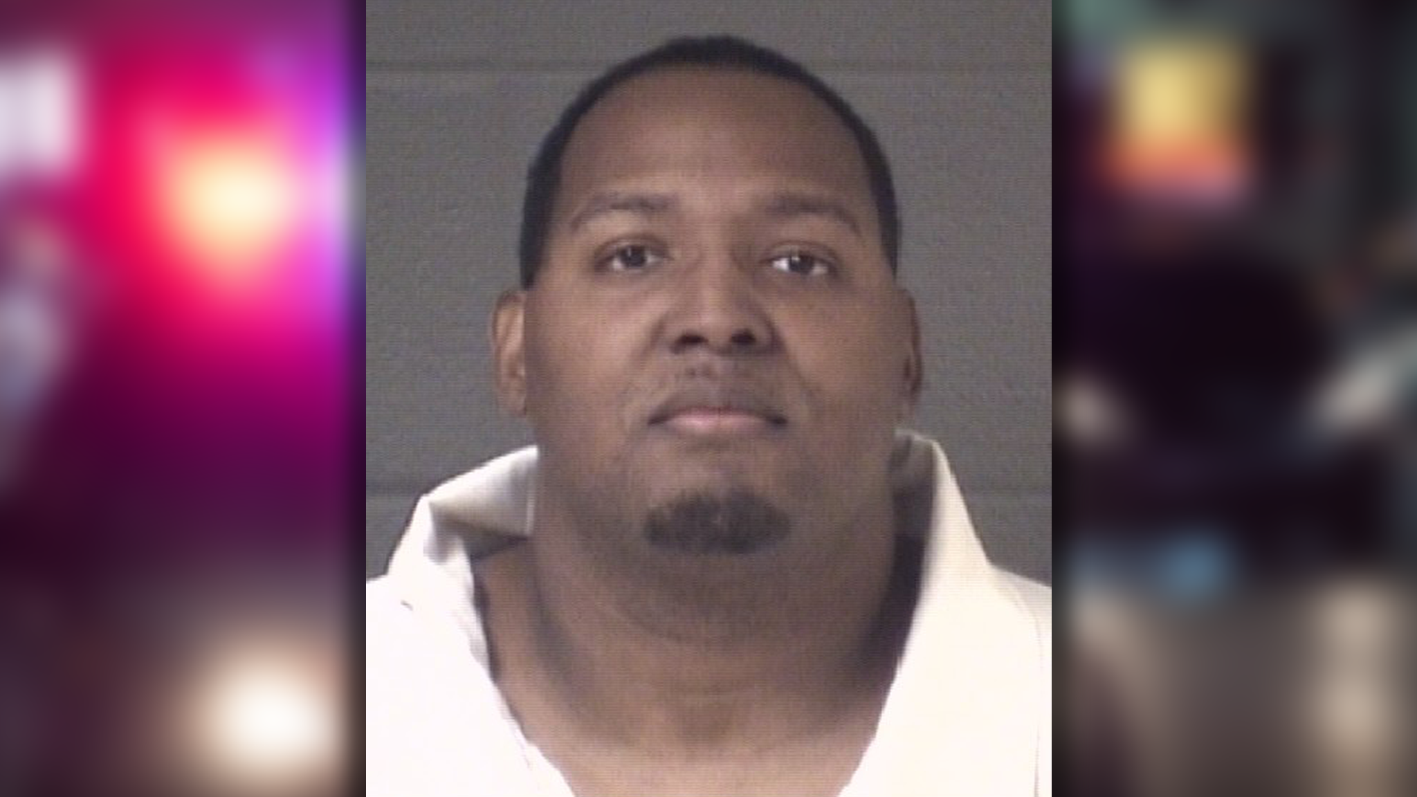 Man arrested after firing into occupied vehicle, officers say