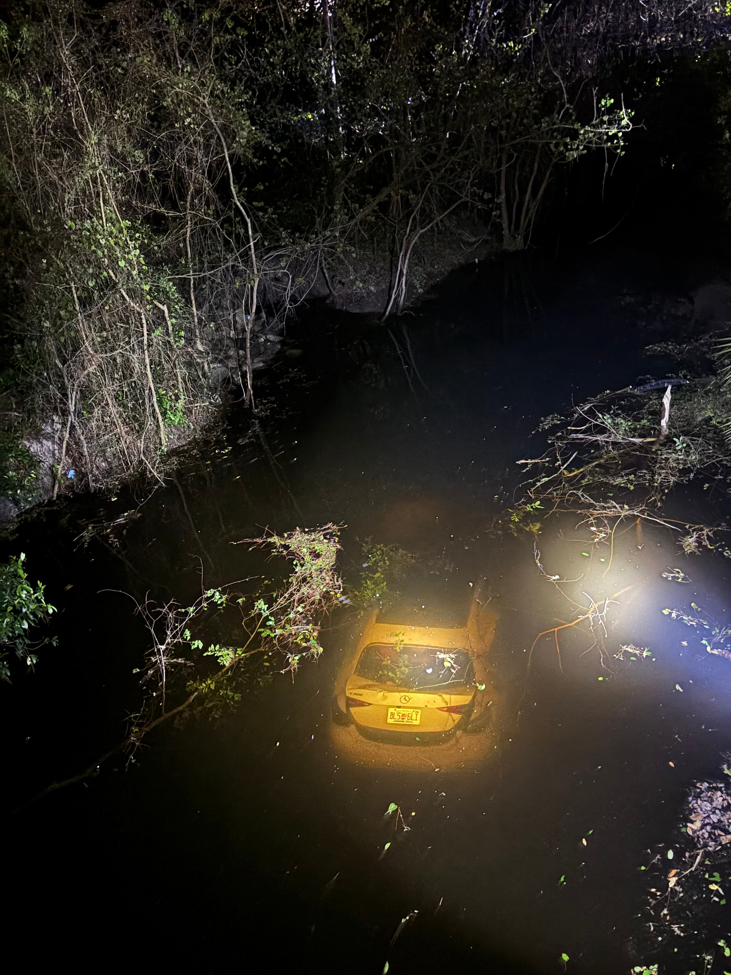 Navy sailors leap into action to save Pensacola man from submerged vehicle