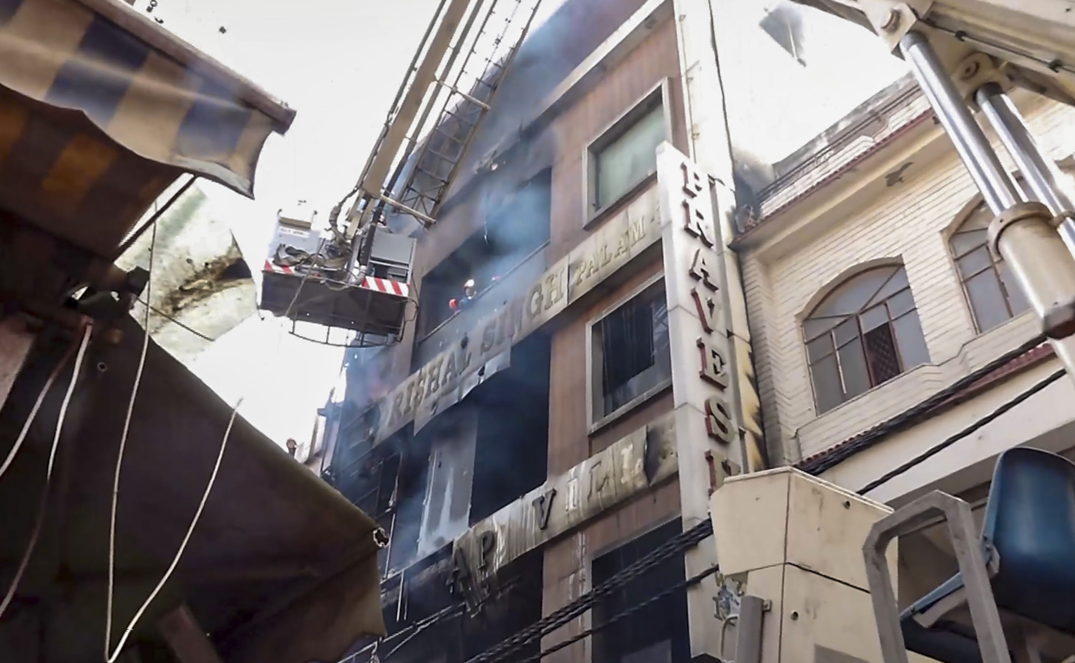 Three children among 7 of family killed in massive fire at multi-storey ...