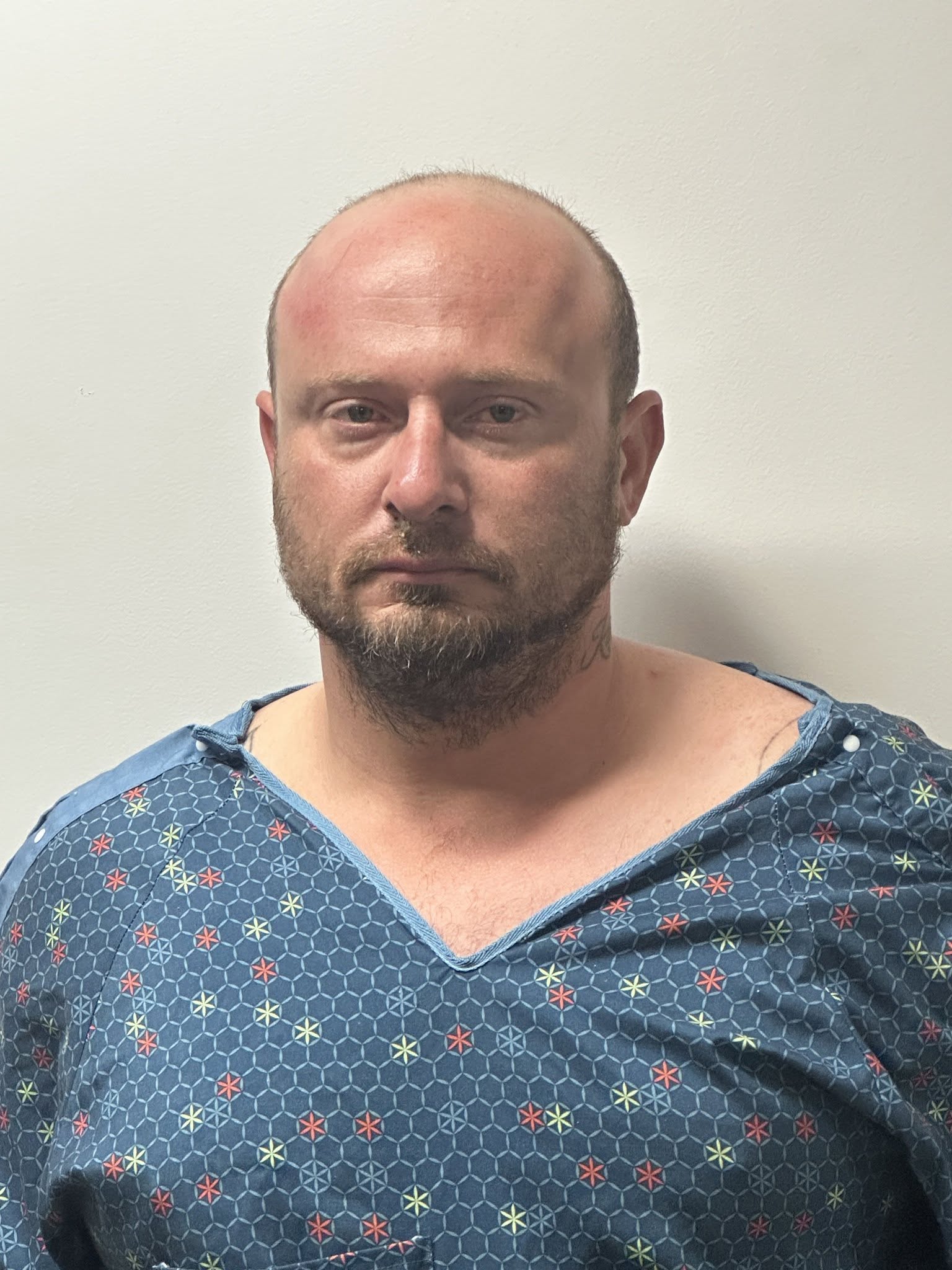 Man accused of shooting father in face with crossbow now in custody