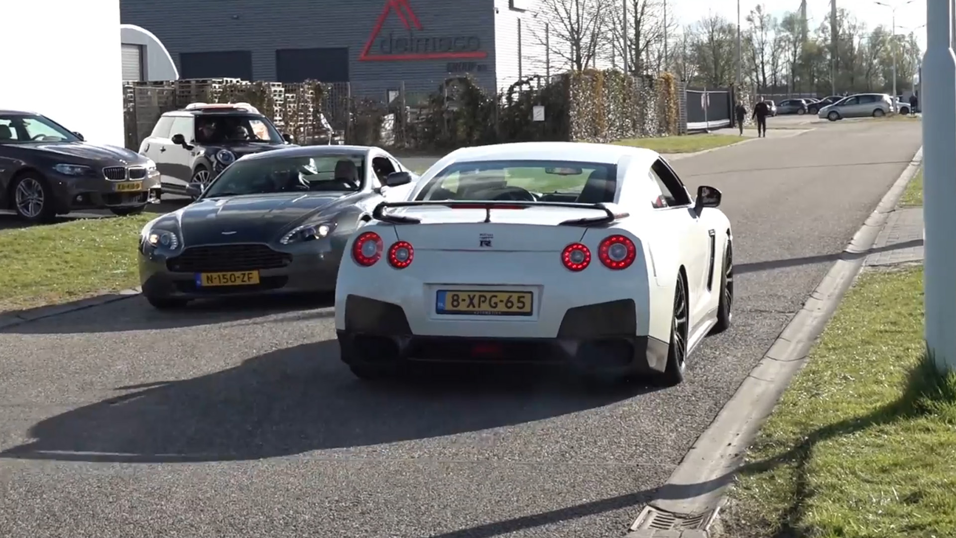 Nissan GT-R R35 Almost Crash With Aston Martin Vantage on Narrow Street
