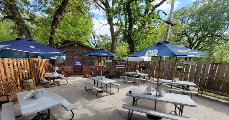 Dine under a massive tree at the Alpine Inn in Nebraska