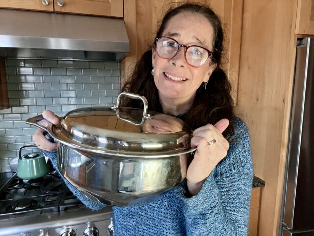 Mindful Momma holding 360 Cookware