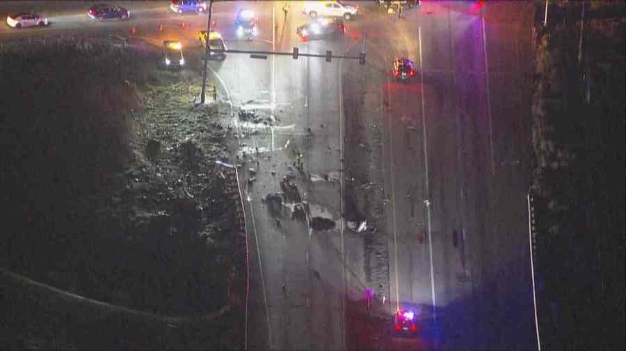 US 85 closed after 1 killed in Brighton crash that caused grass fire