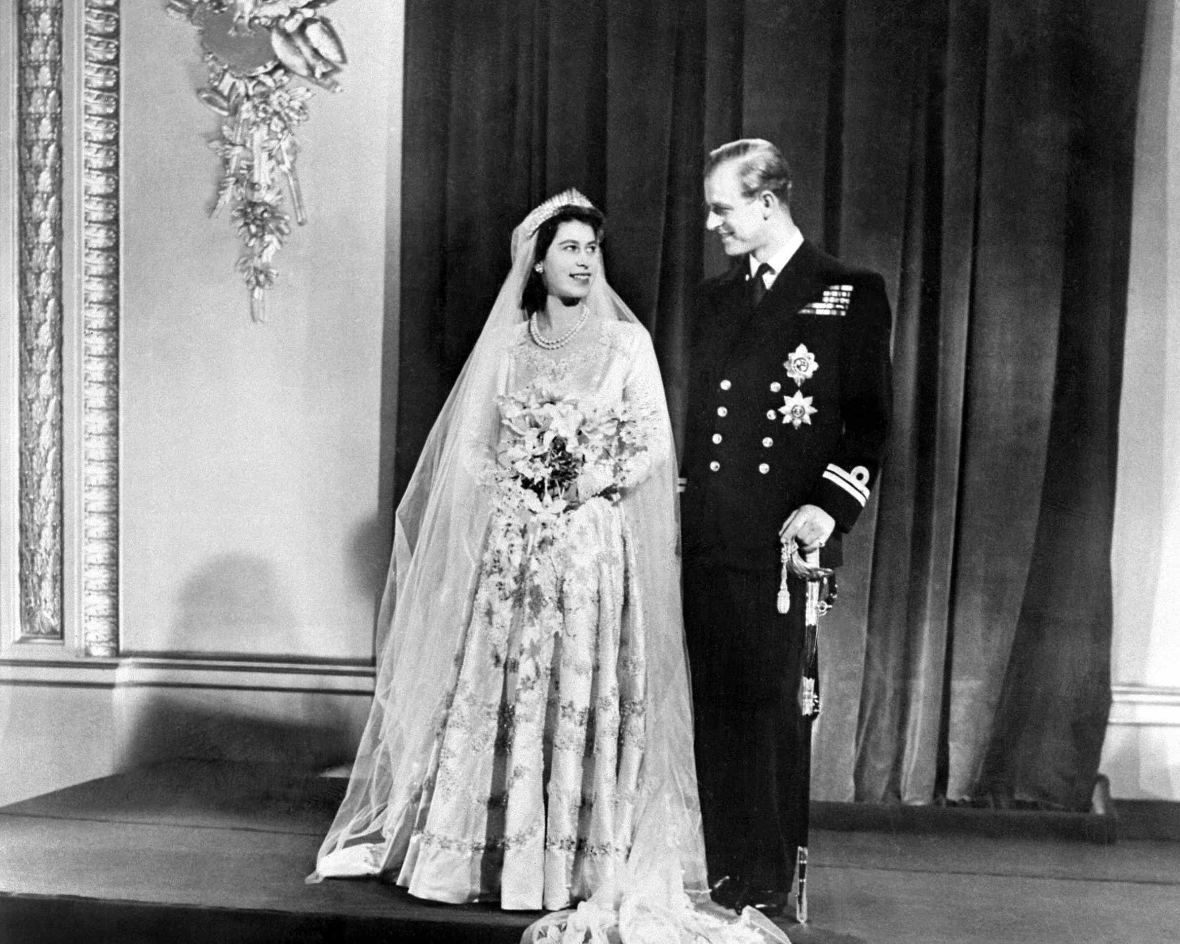 All about Queen Elizabeth’s meaningful $1.6 million wedding dress ...
