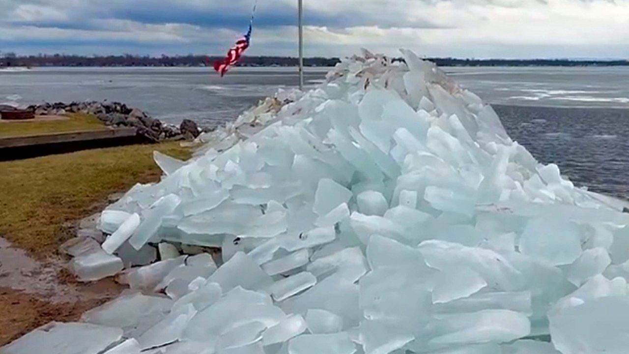 Rare ice formations create striking shoreline scene at New York lake