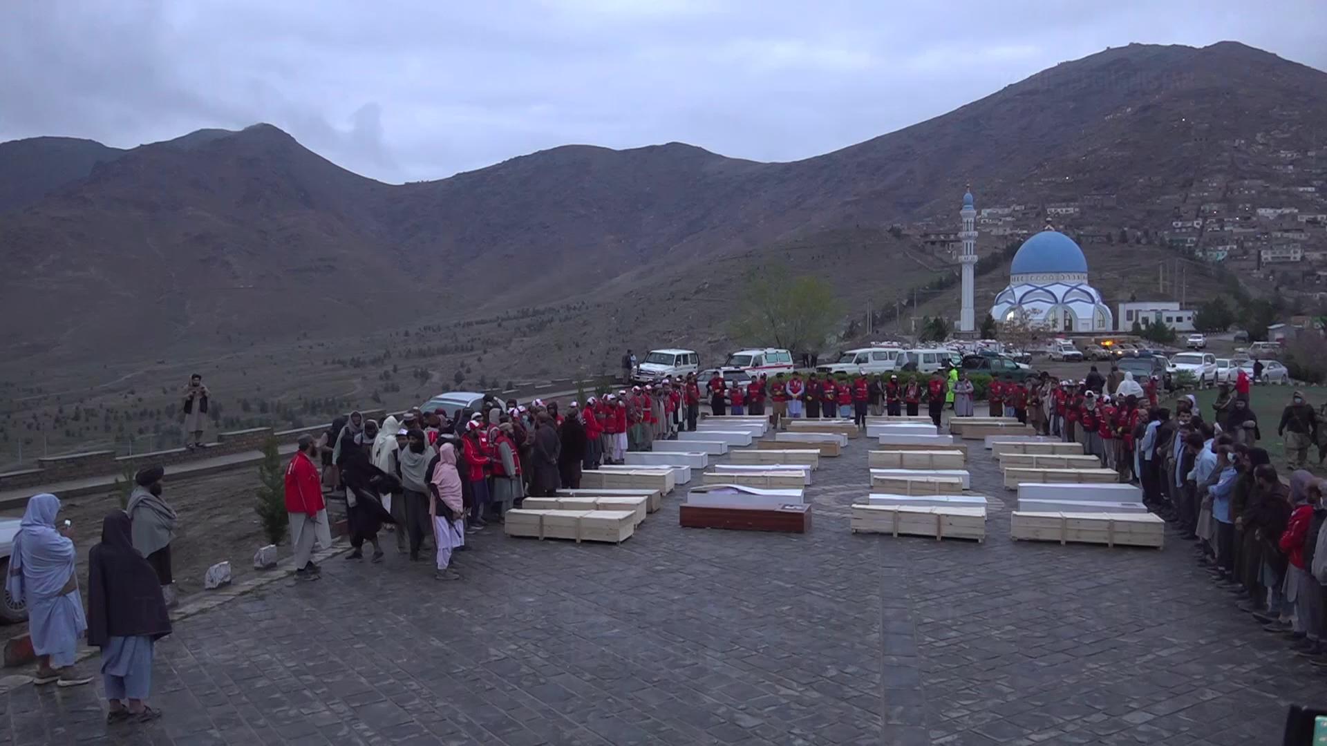 Taliban leaders hold funerals for some of at least 408 killed in airstrike