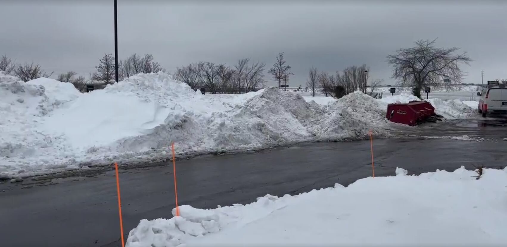 Snowplows working around the clock to clear parking lots