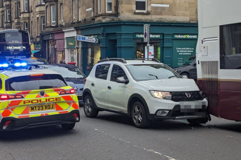Car crashes into bus in Edinburgh as emergency services race to scene