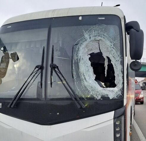 Cargo truck wheel kills bus driver, averts disaster