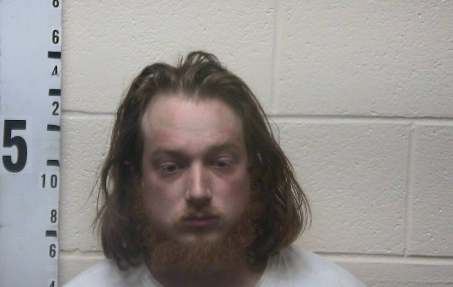 Man charged with rape after victim reports to school official