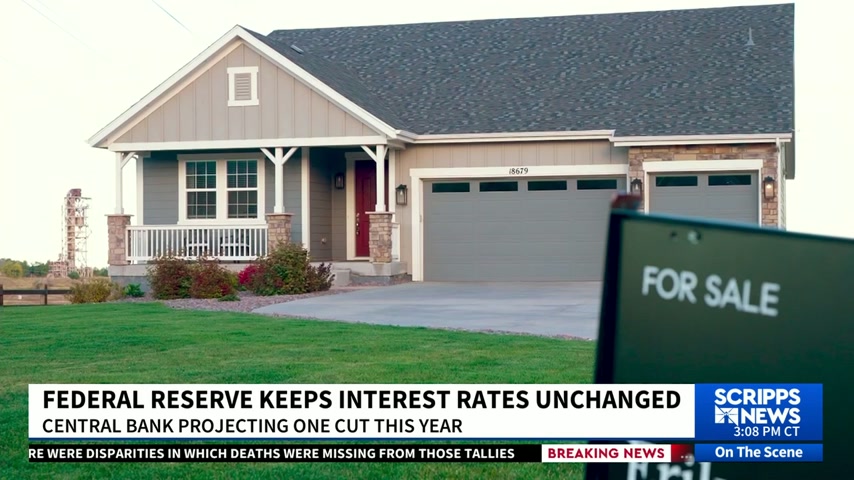Federal Reserve holds interest rates steady, projects one cut this year