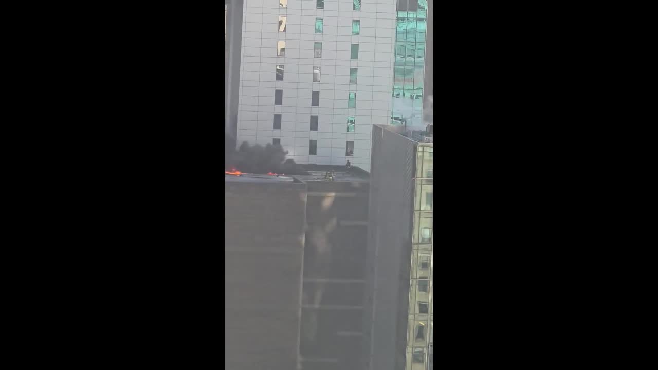 Midtown high-rise fire sends thick smoke over Manhattan skyline in New ...