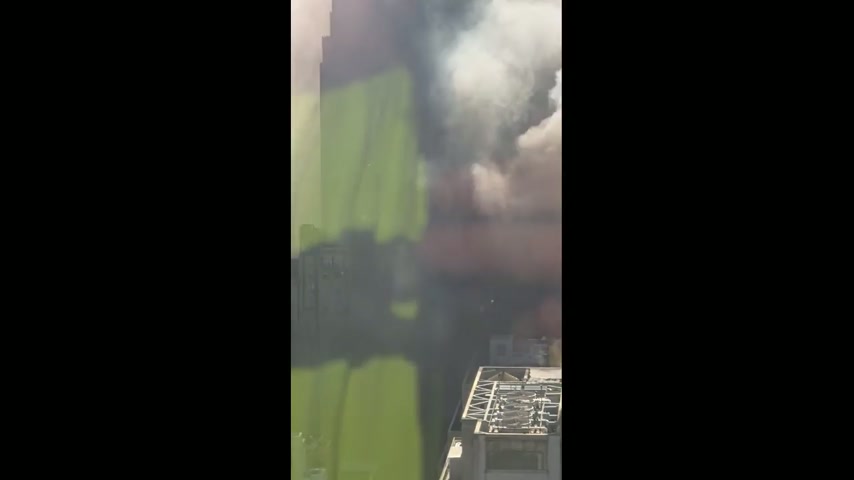 Midtown high-rise fire sends thick smoke over Manhattan skyline in New ...