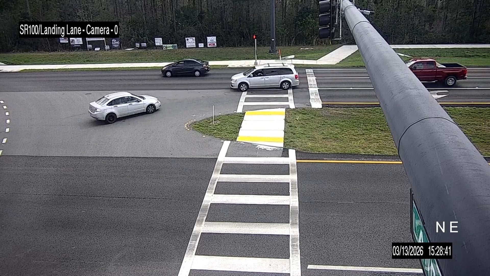 Bizarre video shows car driving backwards down busy highway