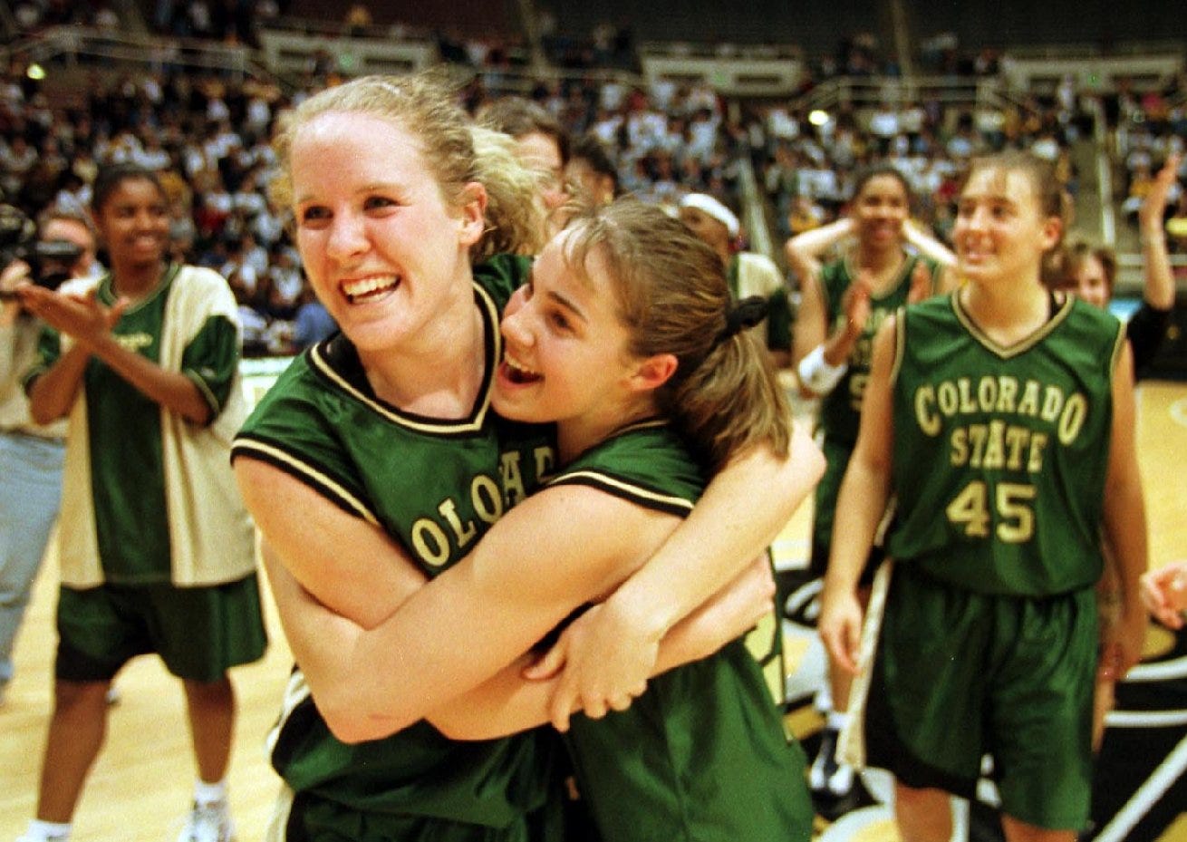 03-15-1998: Colorado State University's Katie Cronin, left, and teammate Becky Hammon hug following their team's 81-75 win over Drake University on Saturday in Lafayette, Ind.