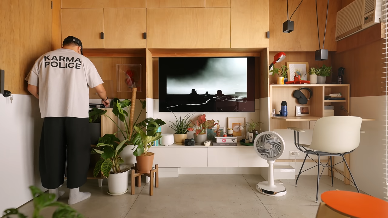 He explored a micro loft - then he saw the storage wall