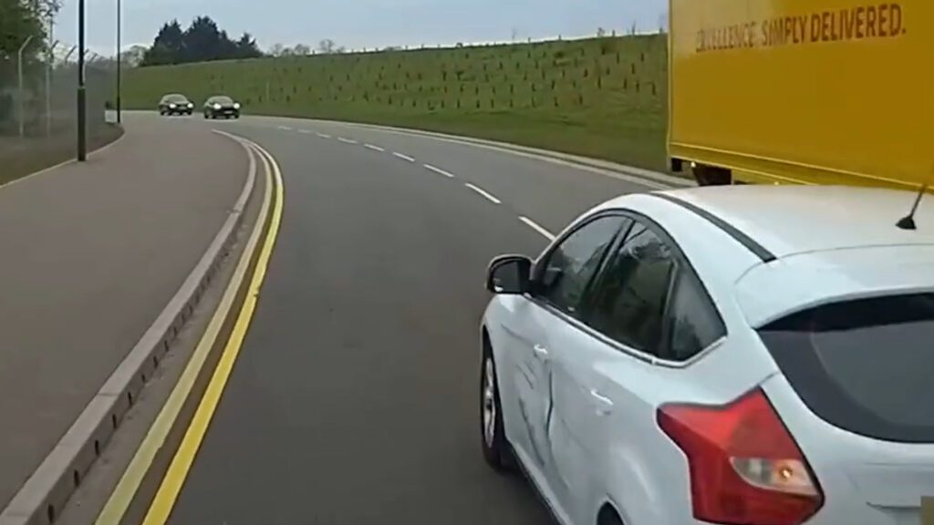 Driver narrowly avoids head-on crash with HGV while overtaking<br><br>