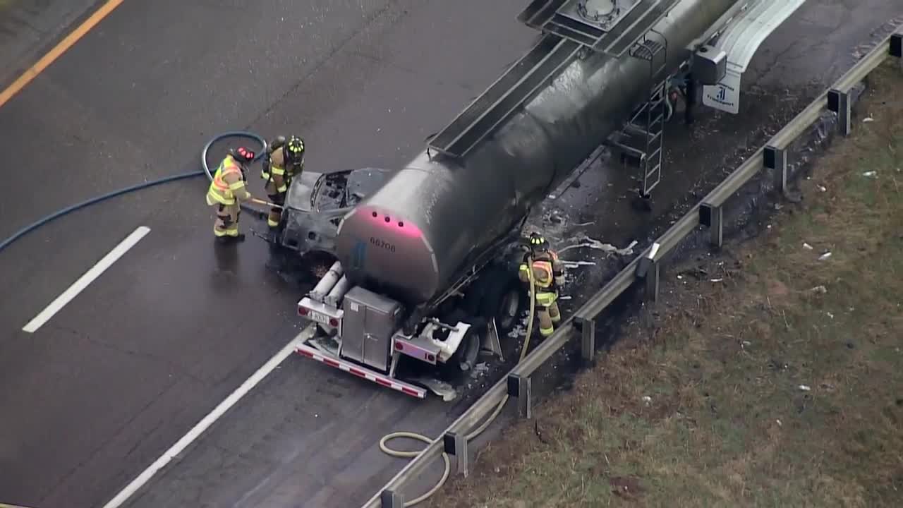 Raw video: Sky 5 shows scorched vehicle struck under tanker truck on I ...