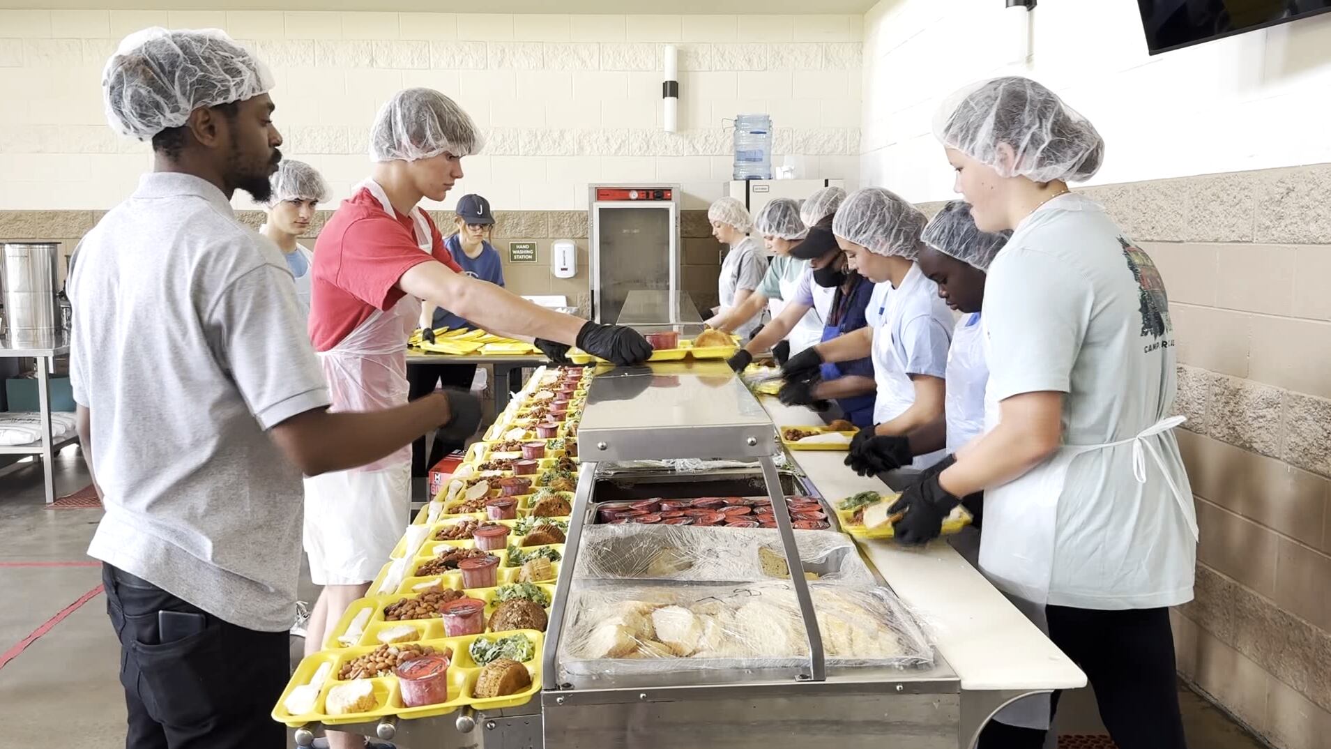Local students help create mural for community kitchen