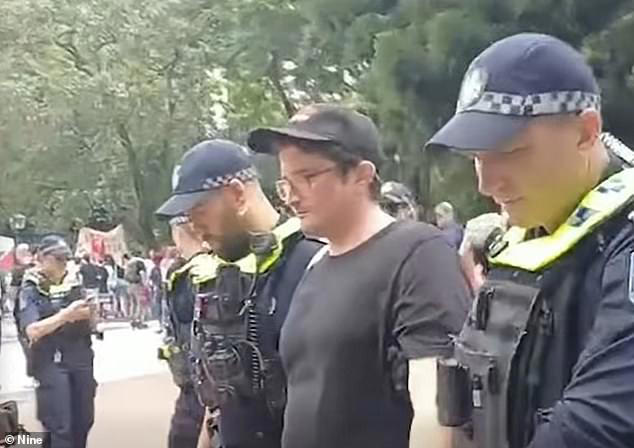 Why woman was arrested over message on her singlet under controversial ...