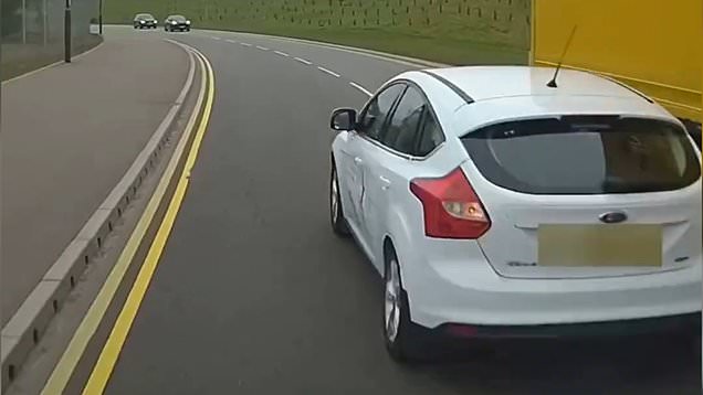 Reckless driver narrowly misses lorry after clipping van in botched ...