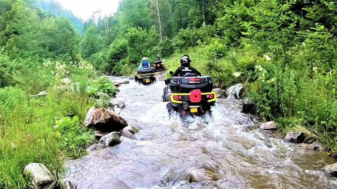 Crossing a huge rocky river off road ride
