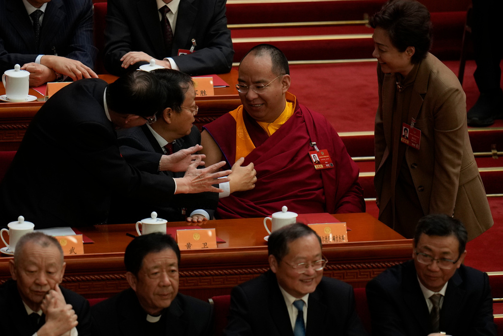 China adopts an ethnic unity law that critics say will cement assimilation