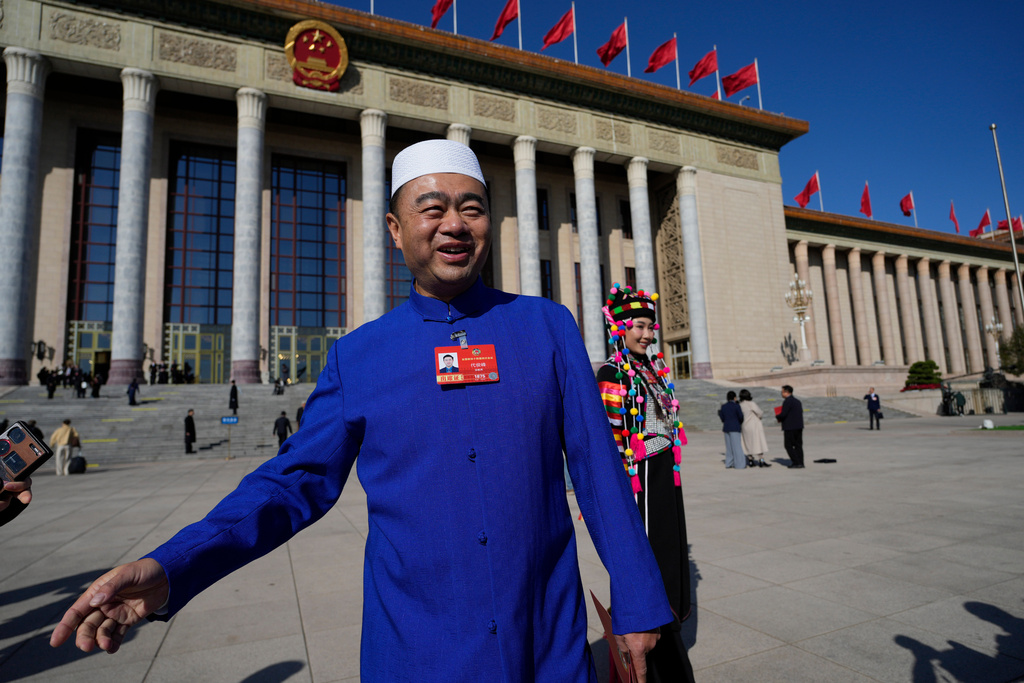 China adopts an ethnic unity law that critics say will cement assimilation
