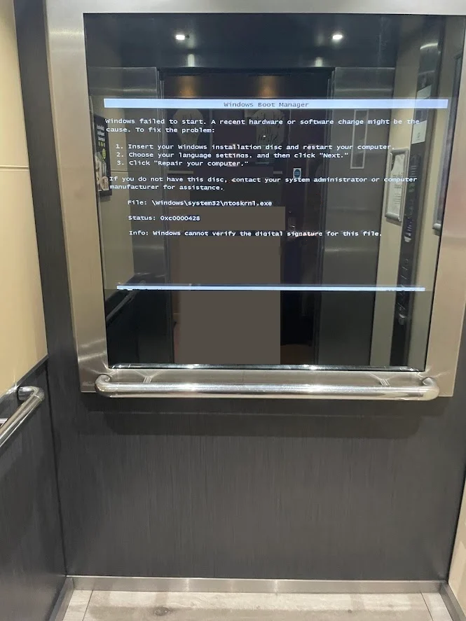 Smart mirror shows dumb Windows in elevator
