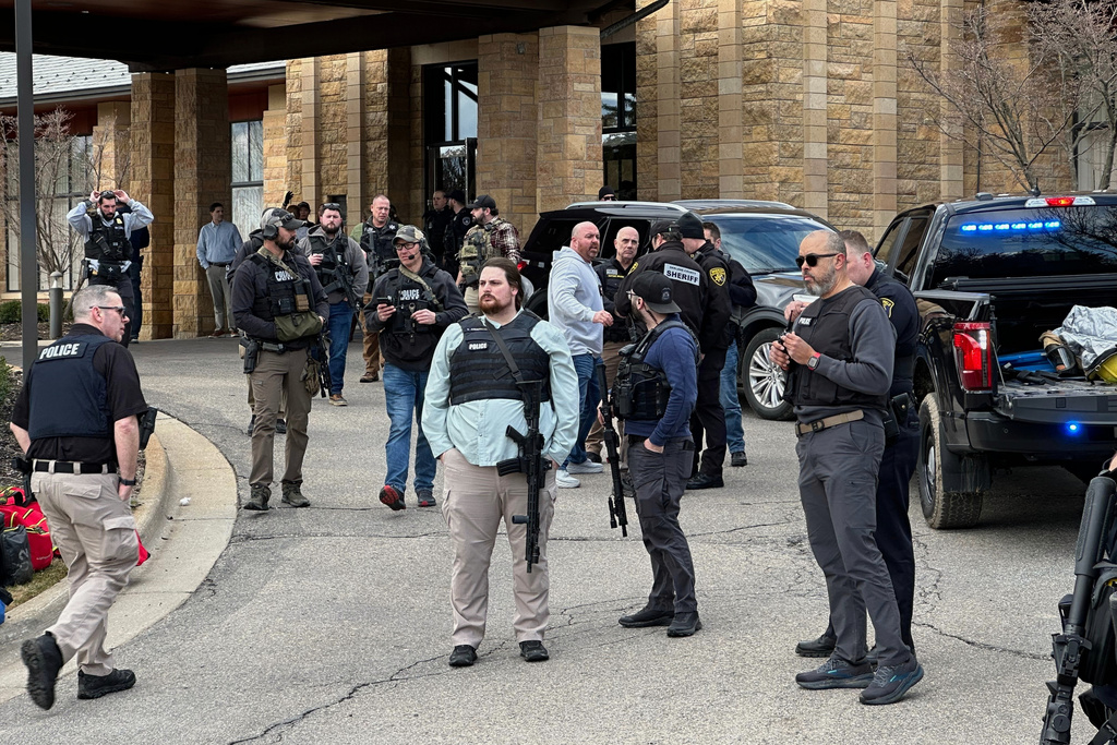 Armed man rammed vehicle into Michigan synagogue and was fatally shot by security, AP source says<br>