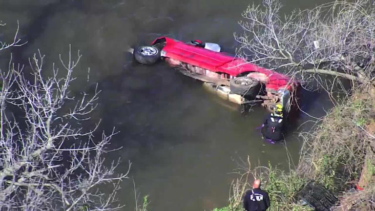 OKCFD crews rescue person after pickup truck crashes into Lake Overholser