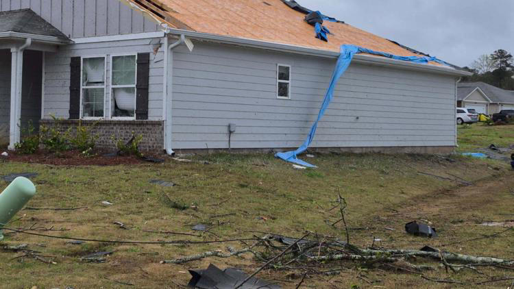Photos: Tornado-warned storms cause damage across central Georgia ...