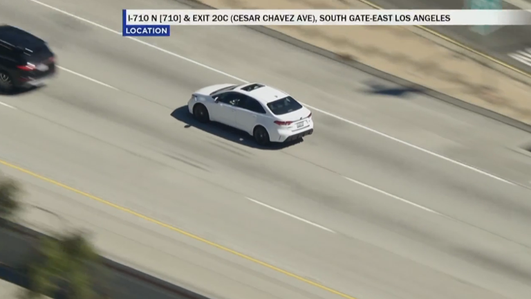 East LA speeding pursuit suspect surrenders to officers after standoff ...