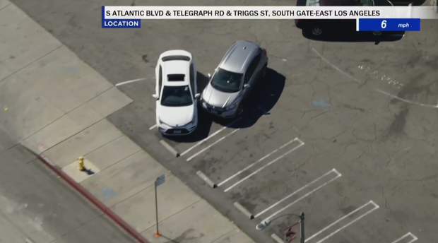 East LA speeding pursuit suspect surrenders to officers after standoff ...