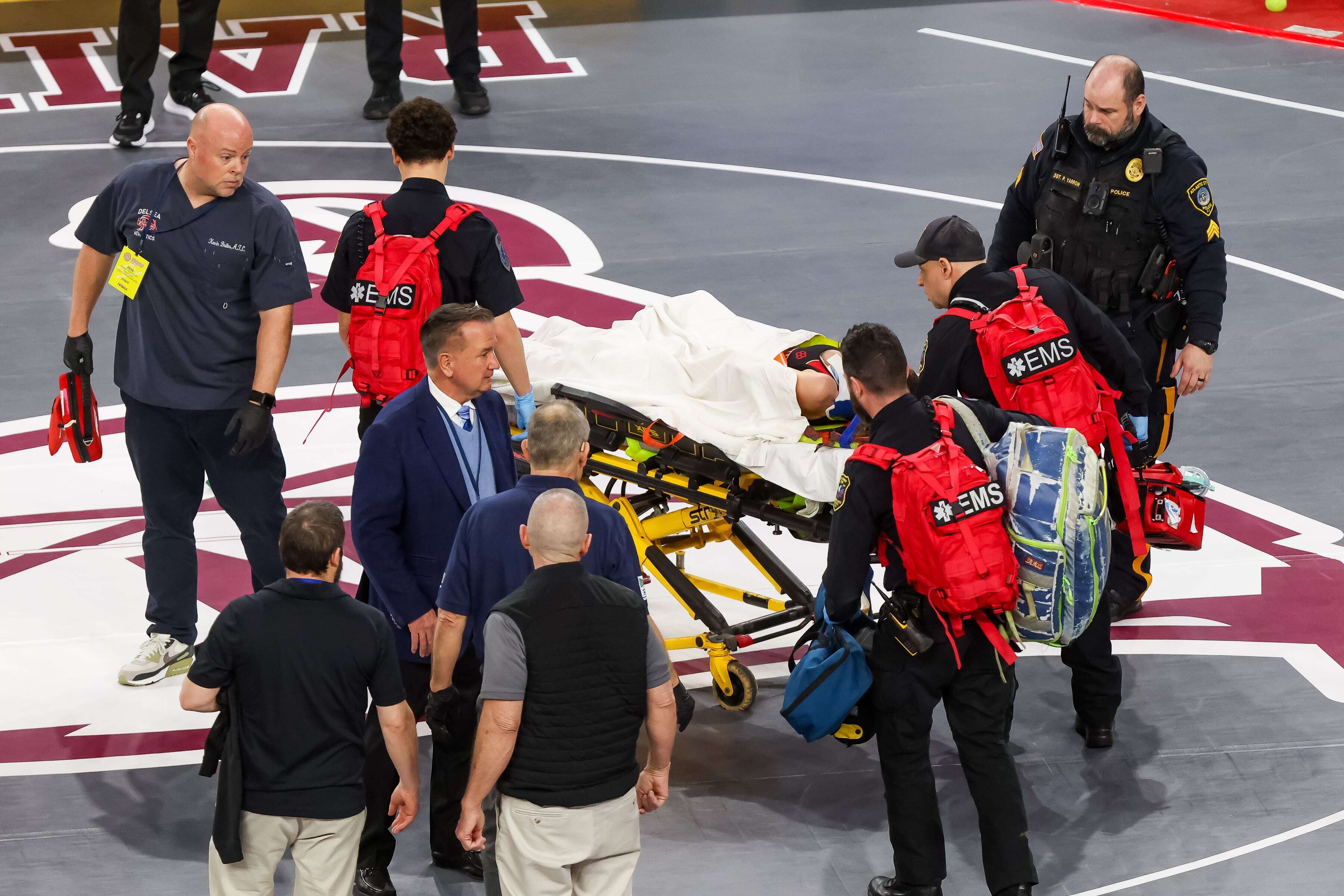 Wrestler stretchered off after 1st round match at NJ state championships