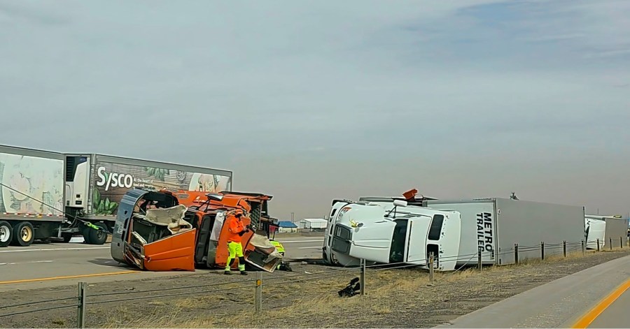 Photos: Windstorm in Wyoming topples semi-trucks, highway closures in place<br><br>