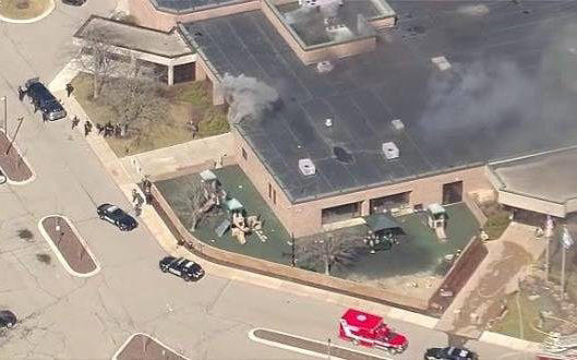 Police found a large amount of explosives in the back of the gunman’s vehicle, a source said