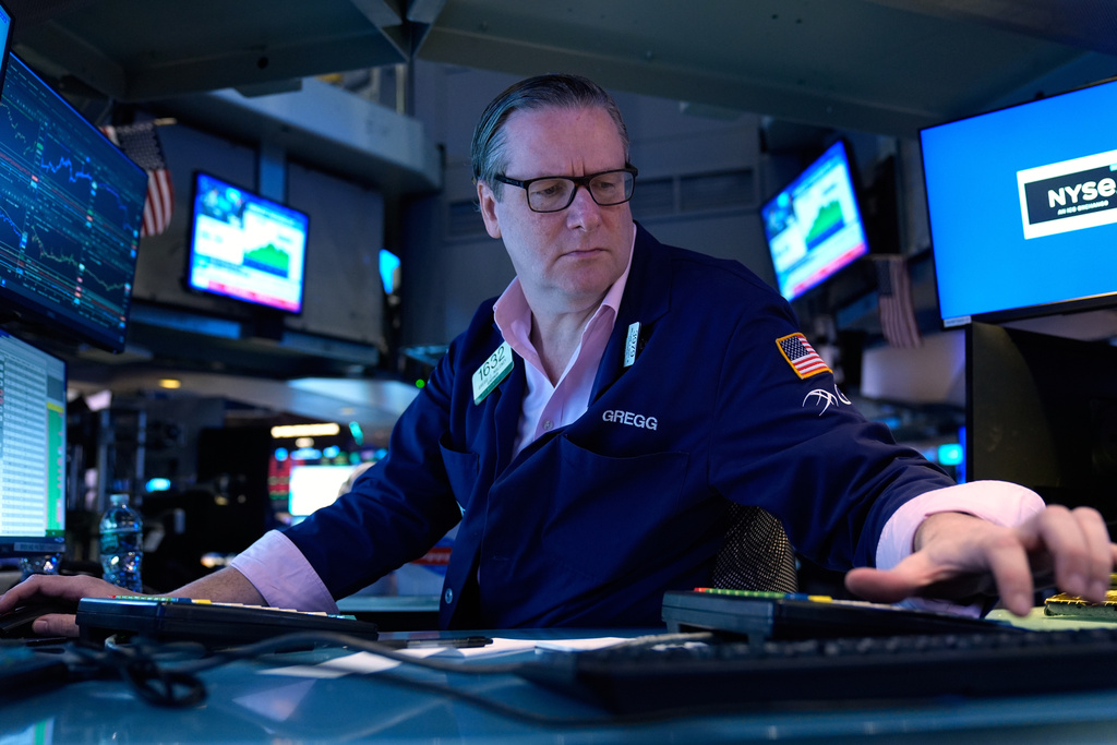 Oil jumps to $100 per barrel and stocks sink worldwide with no clear ...