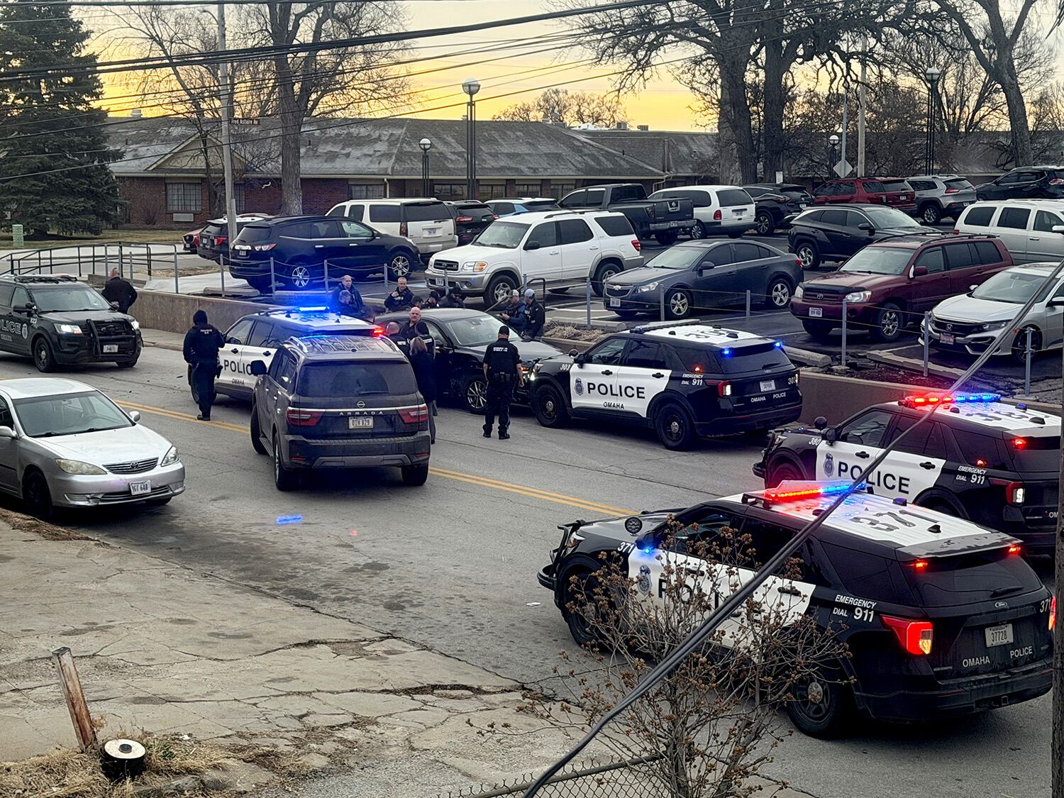 Omaha police chase vehicle after body found during missing person ...