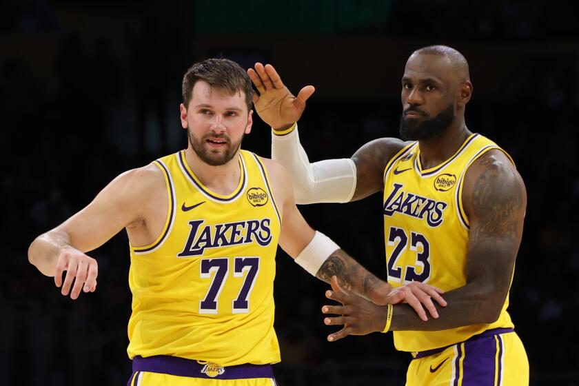 Luka Doncic scores 51 points as surging Lakers rout Bulls in LeBron's ...