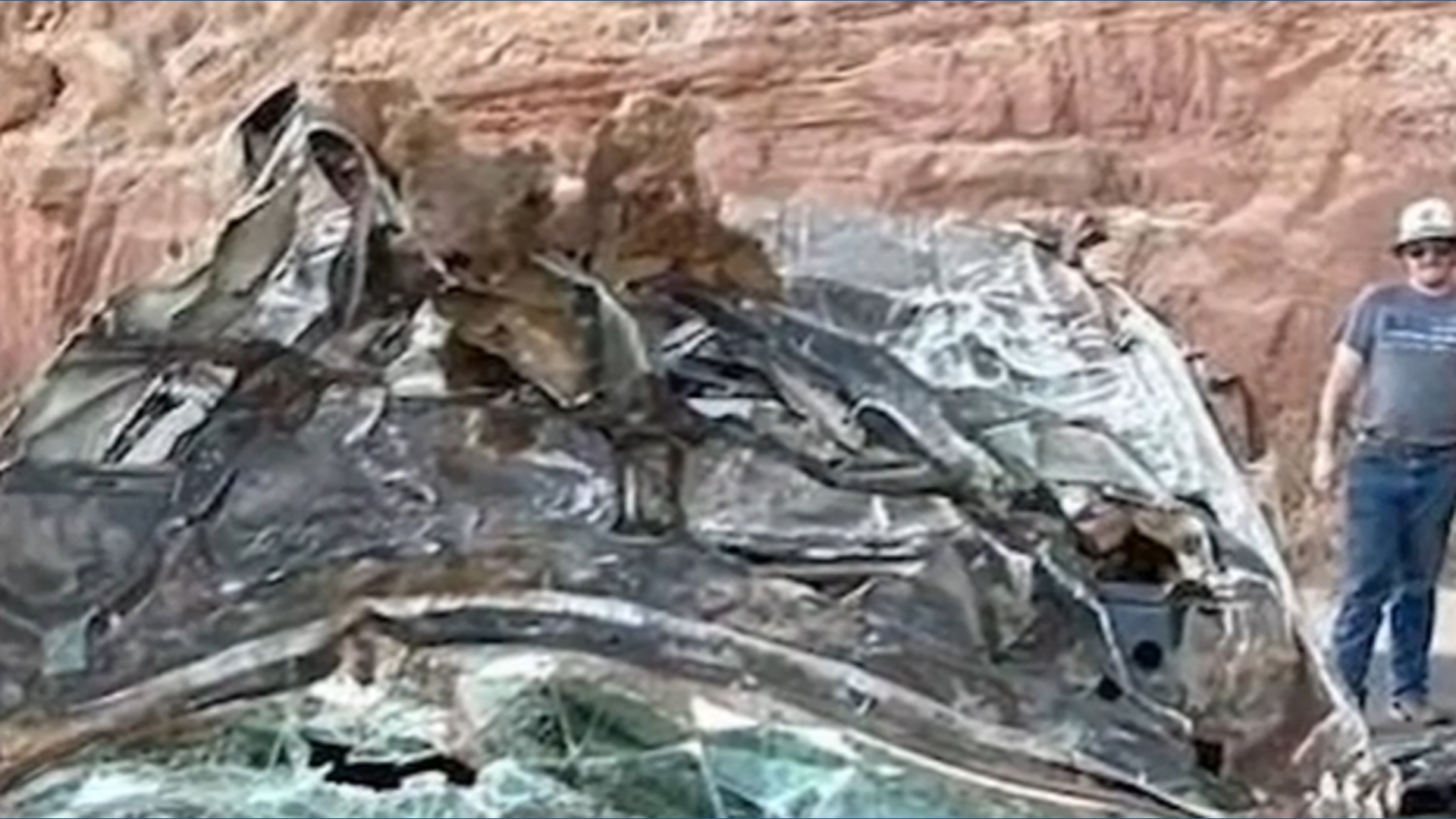 Driver survives after vehicle blows tire and plunges 200 feet into ...