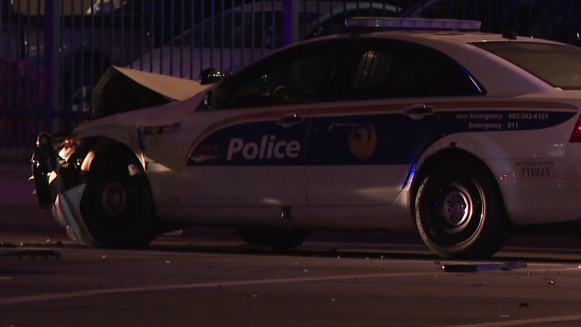 2 hospitalized, including officer, after crash in central Phoenix