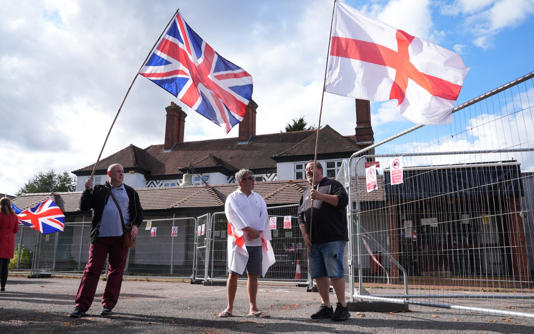 Protesters outside the Bell Hotel in Epping last year - Lucy North/PA Wire