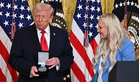 Donald Trump shamelessly takes female athlete's medal at Women's ...