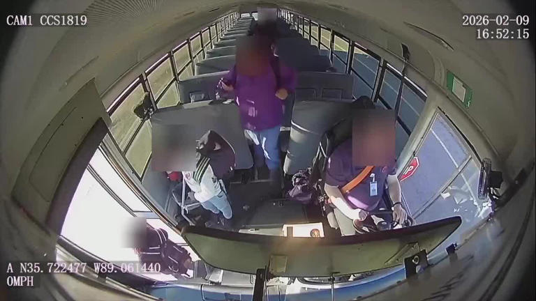 Watch: Semi-truck nearly hits teen while passing stopped school bus