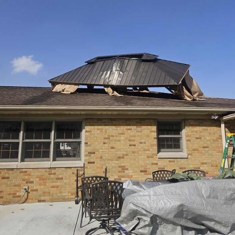 Wind damage: Gas station canopy topples; gazebo lands on home