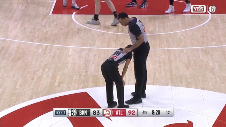 Watch: NBA ref injured in hard collision with cameraman on the court